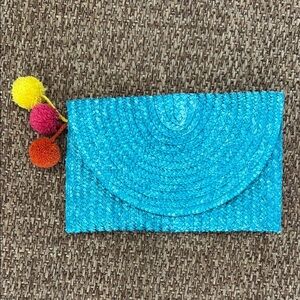 Shiraleah Woven Clutch with Pom Poms